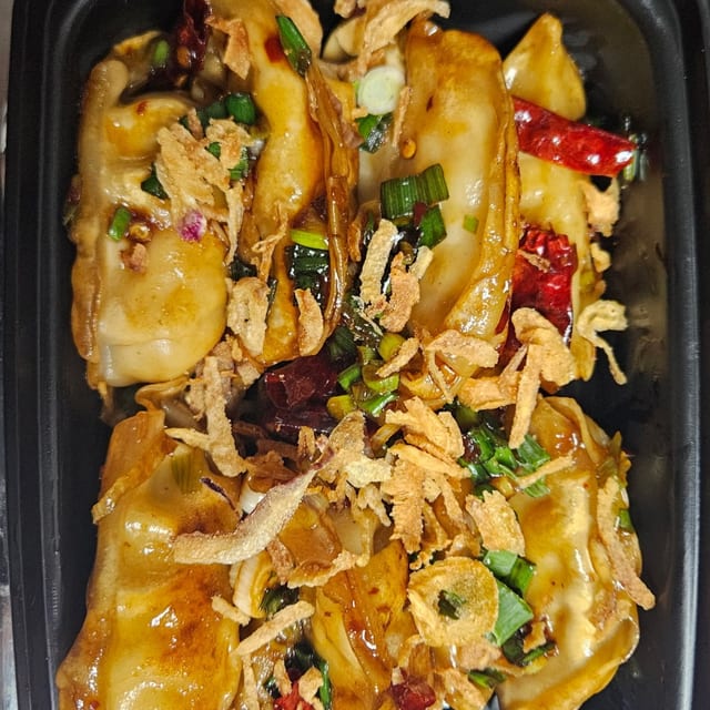 11B. "New" Szechuan Chicken Pot Stickers (12) (Hot & Spicy).